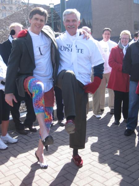 WRC Co-Chair Jim King, and WRC Honorary Chair Dr. David Smith, model their shoes. A special thanks to all the men who joined us wearing women's shoes to help us reinforce our message that there is no excuse for abuse in any relationship!
